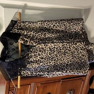 Jr size small. Leopard print button down shirt. Black see through lace on top.